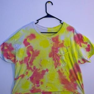 A cropped tie-dyed shirt